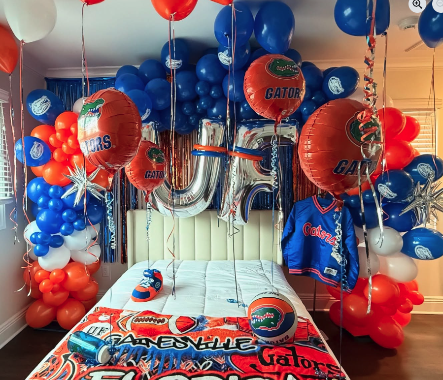 Florida Gators themed party setup with blue and orange balloons